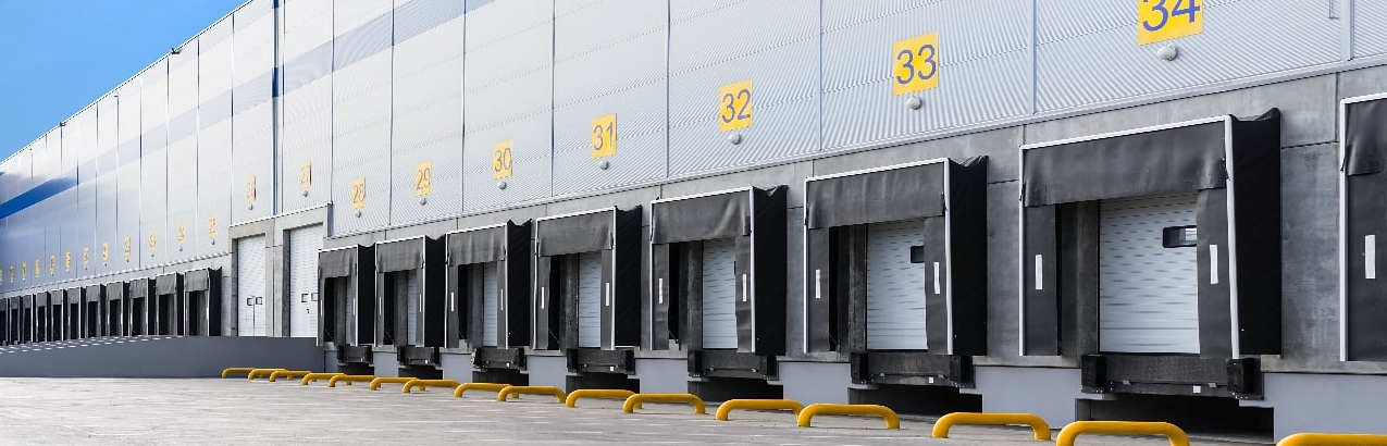 What is the difference between grade level and dock high doors